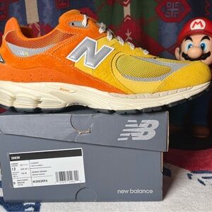 New Balance 2002R Bright Orange and Yellow Sneakers